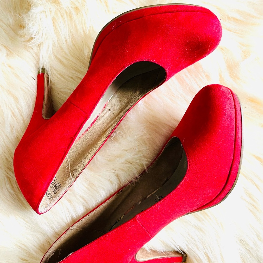 Red faux suede pumps